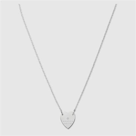 collier coeur gucci|Gucci Collier de perles siglé avec pendentif cœur.